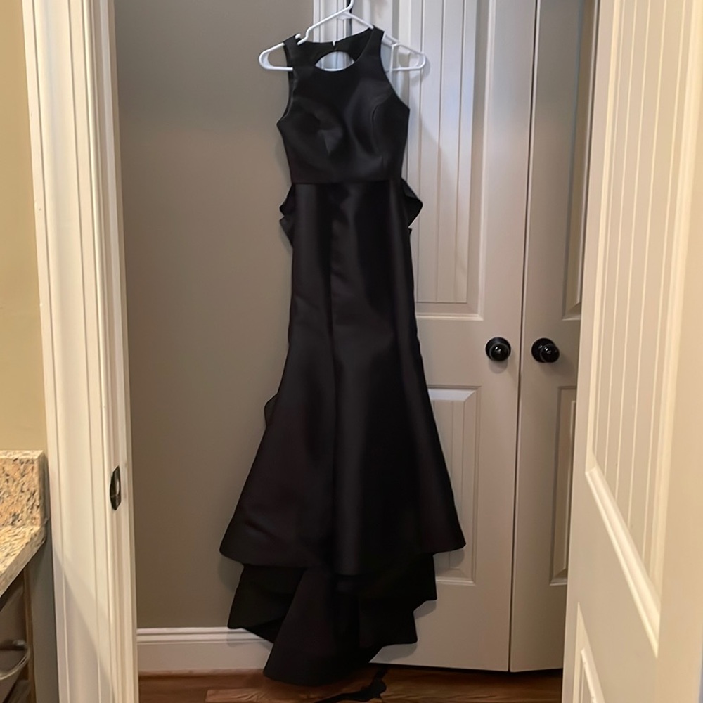 Black rose accented Sherri Hill prom dress